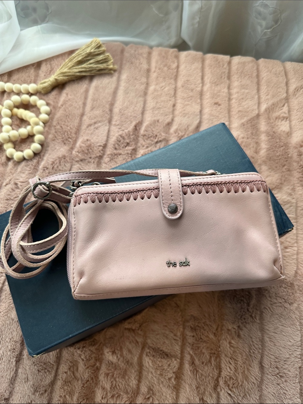 The Sak Blush Pink Leather Crossbody Wallet with Whipstitch Detail
